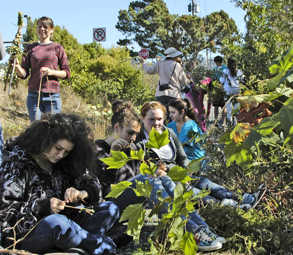 photo of people working on nature sculptures at Cerrito creek