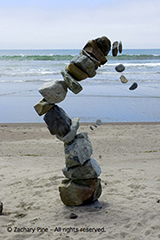 photo of a toppling rock tower at Stinson Beach, California. 7/27/05.